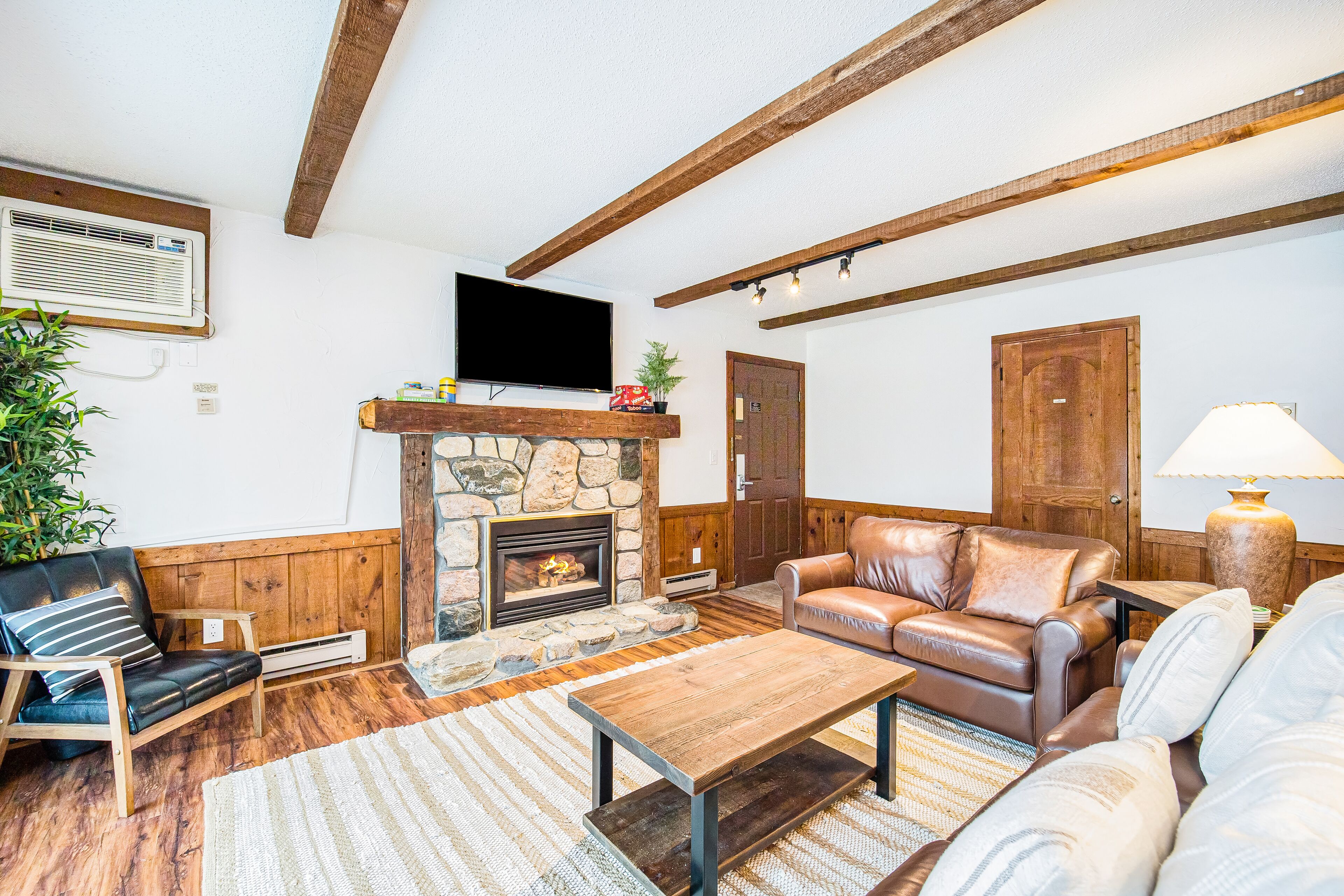 Ski chalet-inspired getaway with free WiFi, gas fireplace, & golf course view