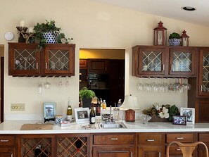 Microwave, dishwasher, coffee/tea maker, cookware/dishes/utensils