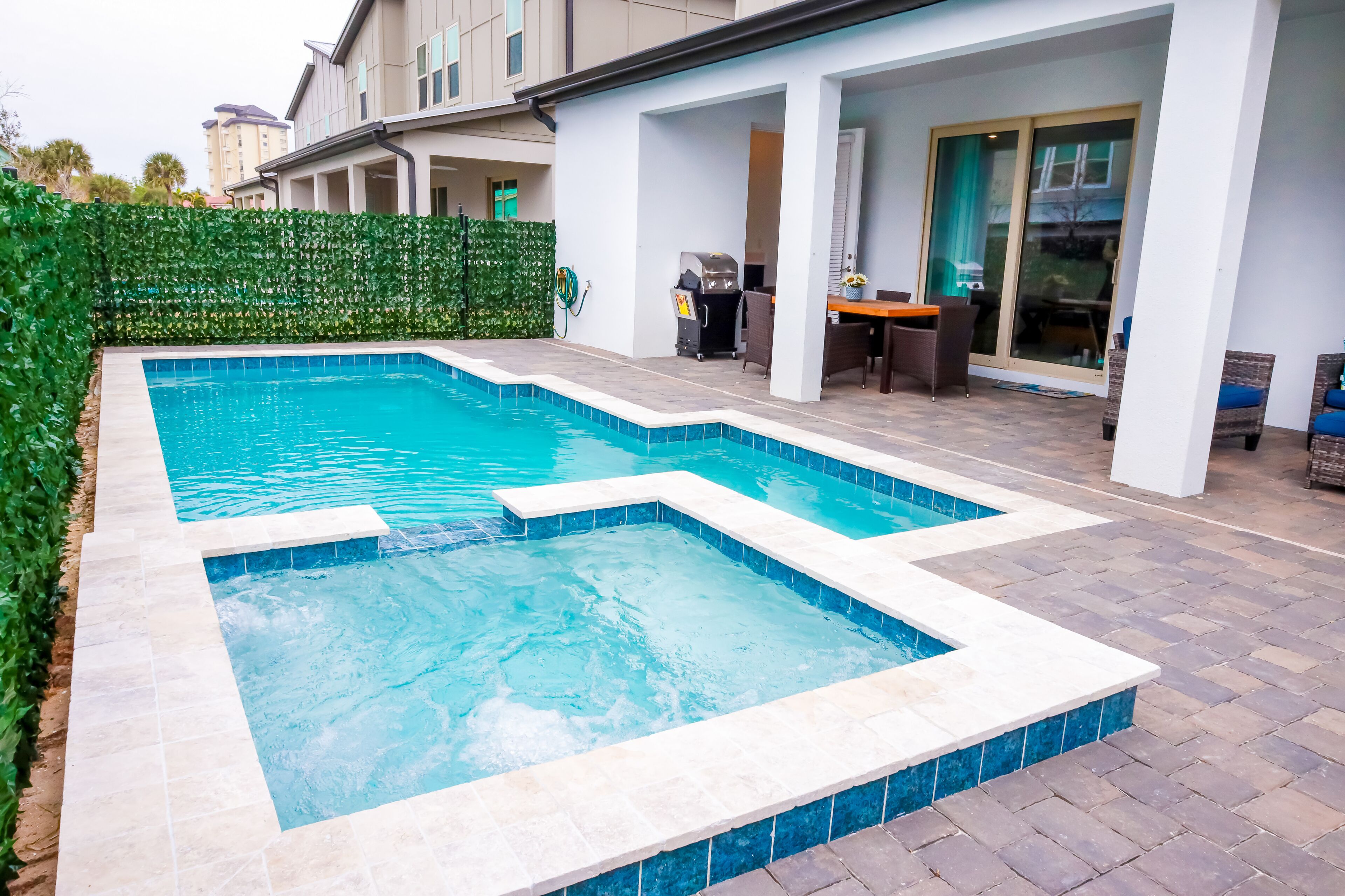 Inviting beach home with private pool, pool spa, upgraded amenities, W/D, & A/C