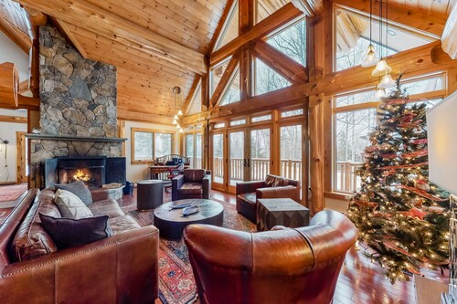 Expansive Getaway with Mountain Views, Hot Tub, Home Theater & Game Room