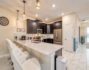 Fridge, microwave, oven, stovetop - SPECIAL WINTER REDUCTIONS/CHAMPIONS GATE RESORT - 9 Bed , 5 bath (Davenport)