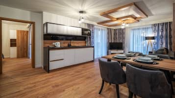 Apartamento (H1) | Zona de estar | Una televisión de pantalla plana