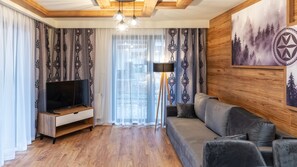 Apartment (H1) | Wohnbereich | Flachbildfernseher