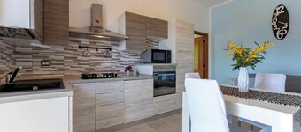 Holiday Home 'Villetta I Pitosfori' with Terrace, Garden & Wi-Fi