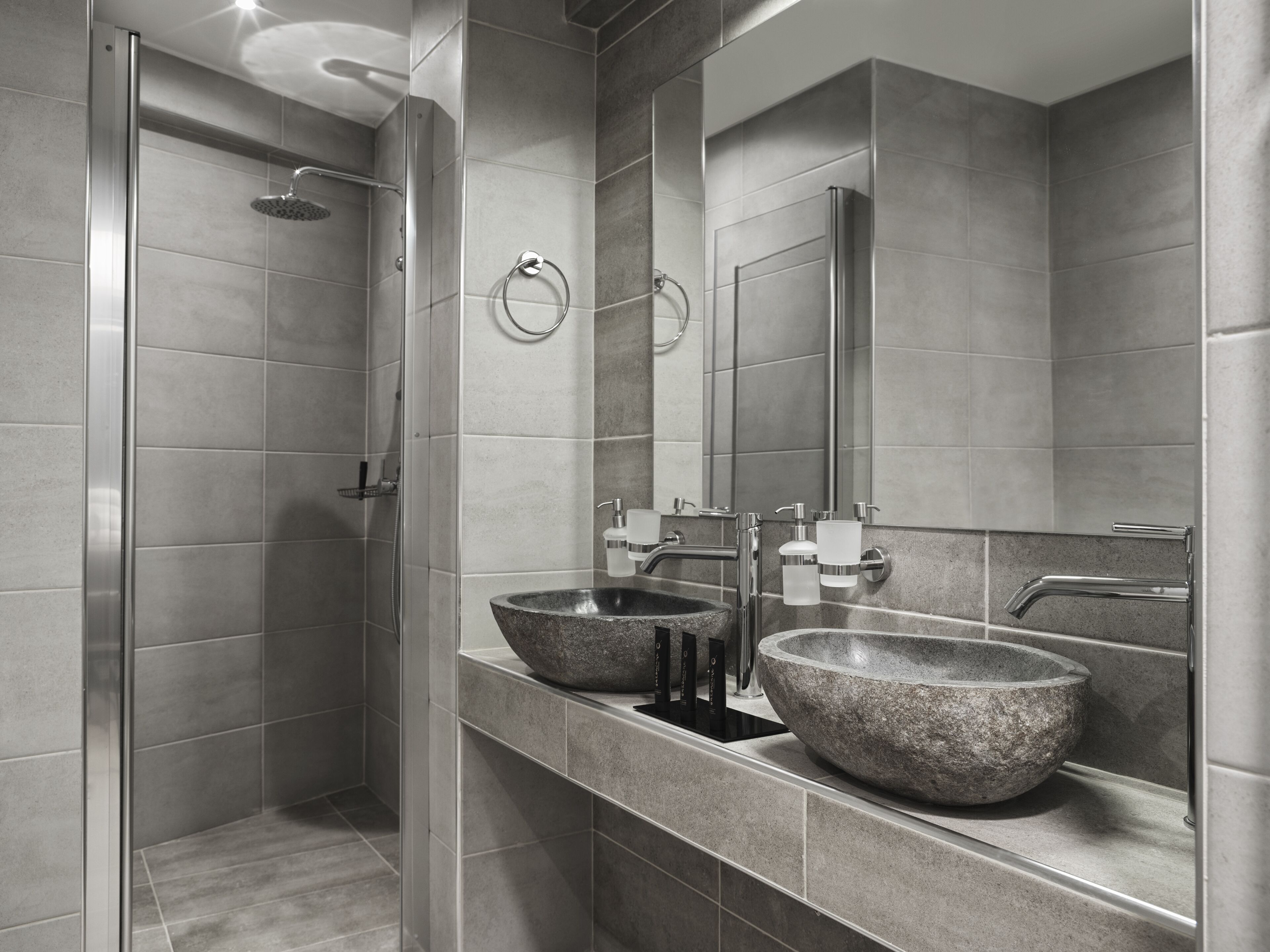 family suite | bathroom | shower, rainfall showerhead, free toiletries, hair dryer