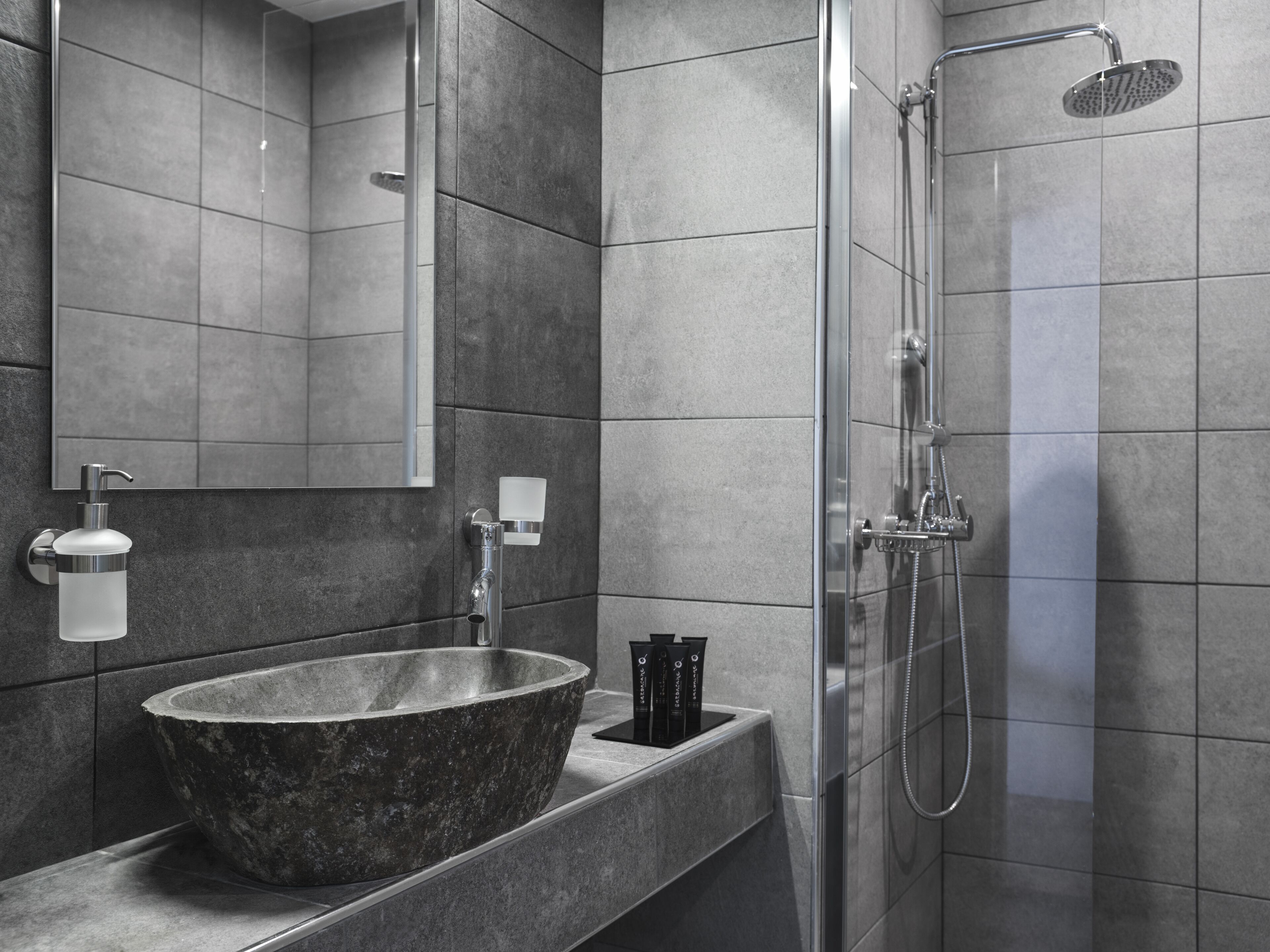 superior suite | bathroom | shower, rainfall showerhead, free toiletries, hair dryer