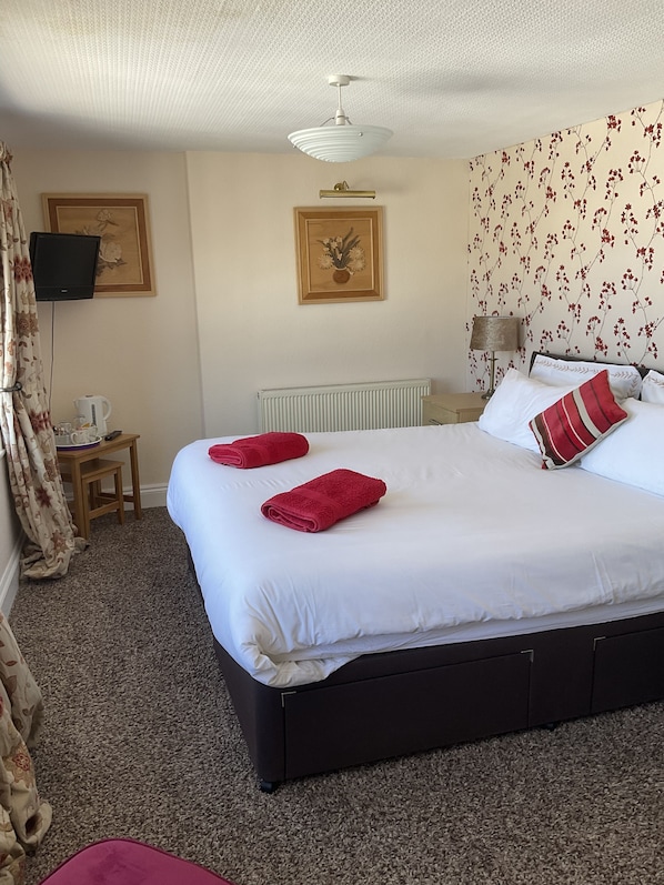 Blackout curtains, iron/ironing board, free WiFi, bed sheets