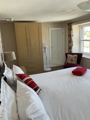Blackout curtains, iron/ironing board, free WiFi, bed sheets