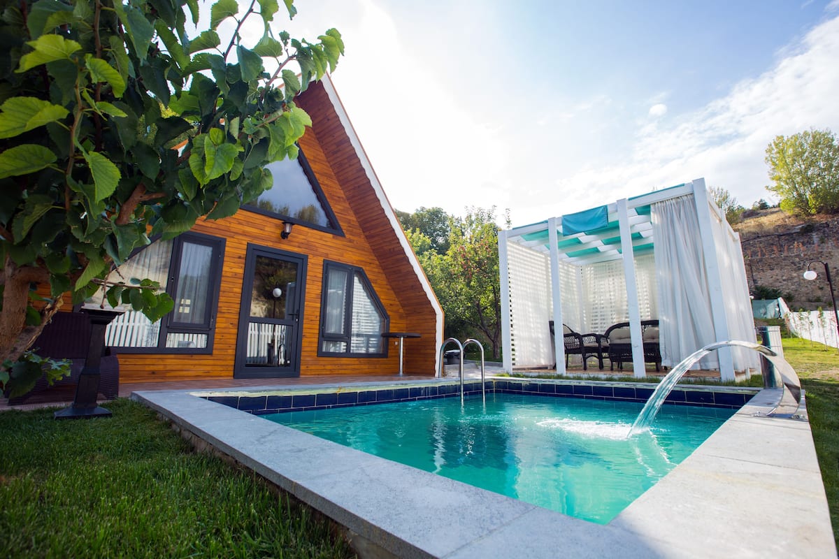 Design Room, Multiple Beds, Non Smoking, Pool View | Garden view