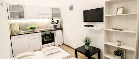 Junior Apartment | Living area | 32-inch LED TV with digital channels, TV