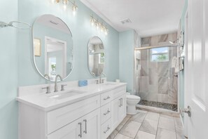 Shower, hair dryer, towels