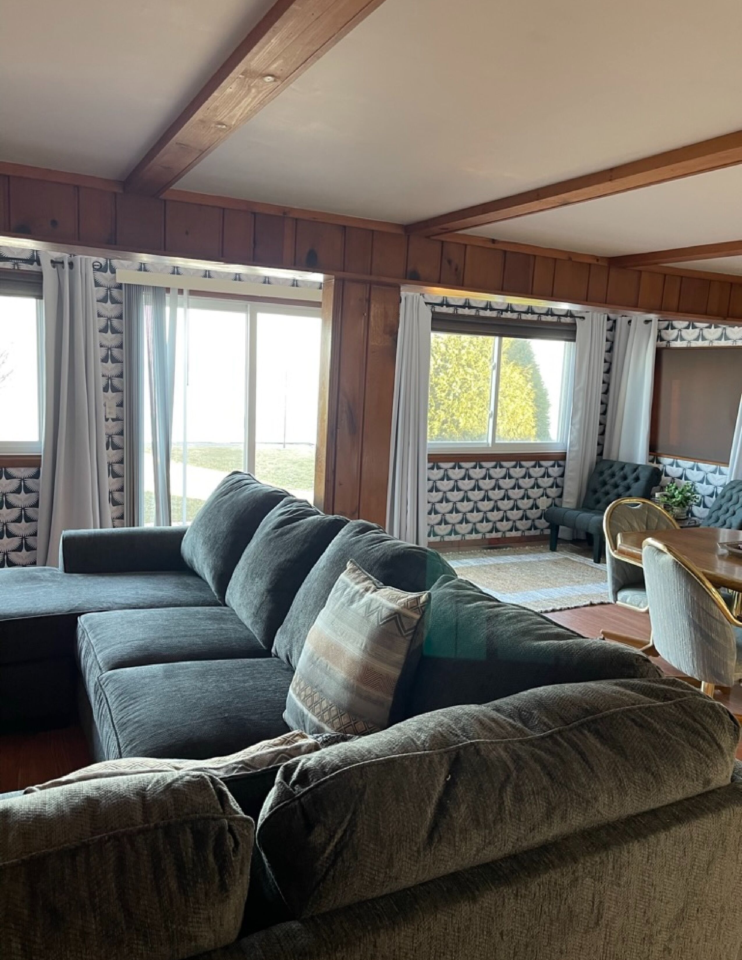 Enjoy a panoramic view from a private home on the water