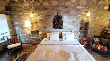 Deluxe Quadruple Room, Mountain View | Egyptian cotton sheets, premium bedding, minibar, in-room safe