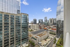 Experience panoramic views of the city from this high-rise building's expansive windows.