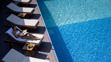 Outdoor pool, pool umbrellas, pool loungers