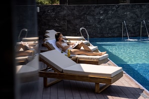 Outdoor pool, pool umbrellas, pool loungers