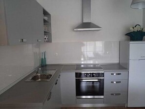 Apartment (Two Bedroom Apartment with Balcony an) | Private kitchen | Fridge