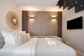 1 slaapkamer, een strijkplank/strijkijzer, wifi, beddengoed