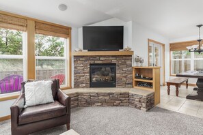 Smart TV, fireplace, books