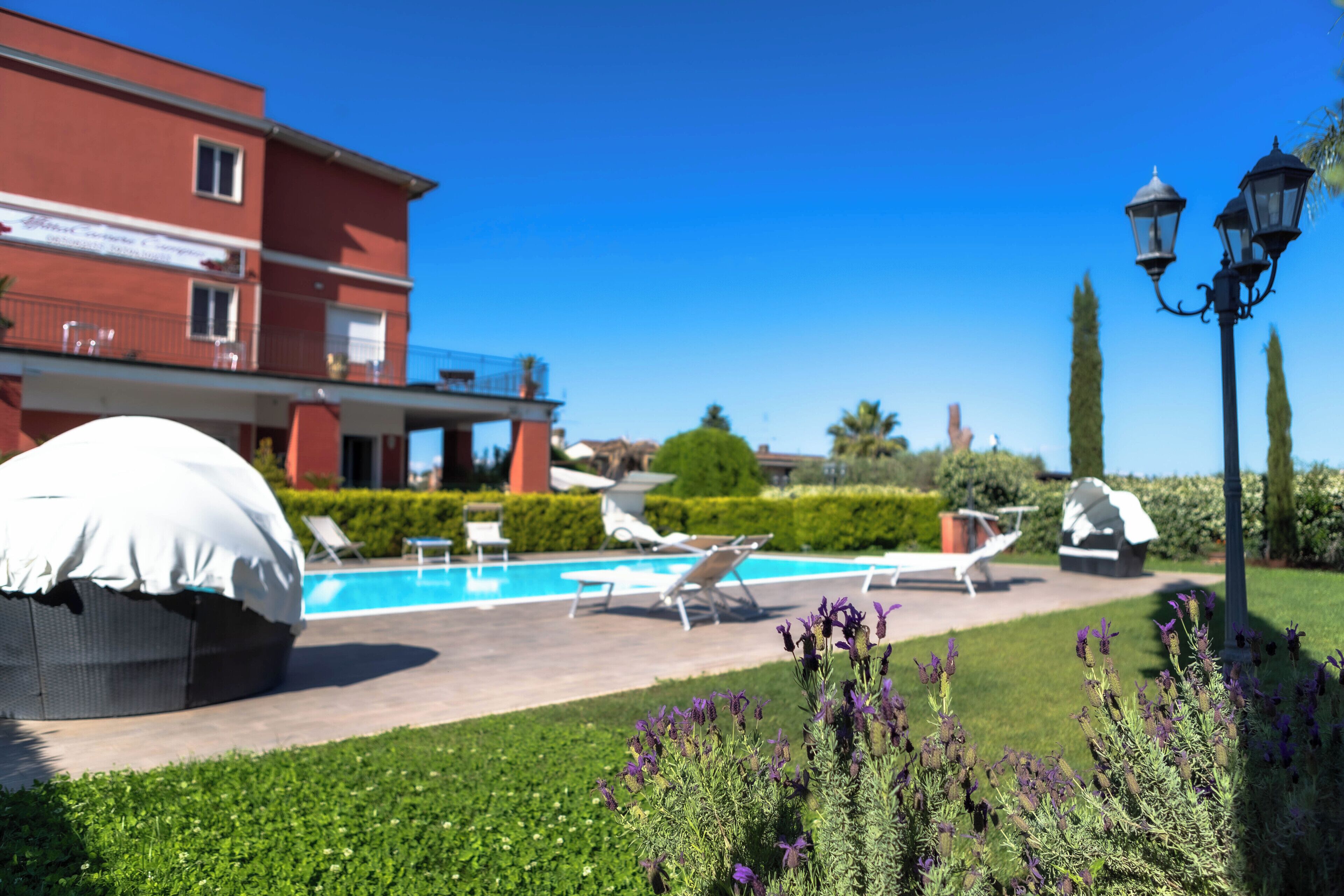 Outdoor pool, open 10:30 AM to 7:30 PM, sun loungers