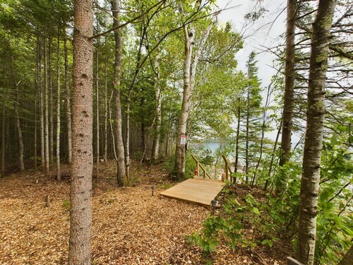 Rustic Cabin sitting on the Edge of Lake Superior with an Outdoor Sauna