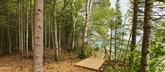 Rustic Cabin sitting on the Edge of Lake Superior with an Outdoor Sauna