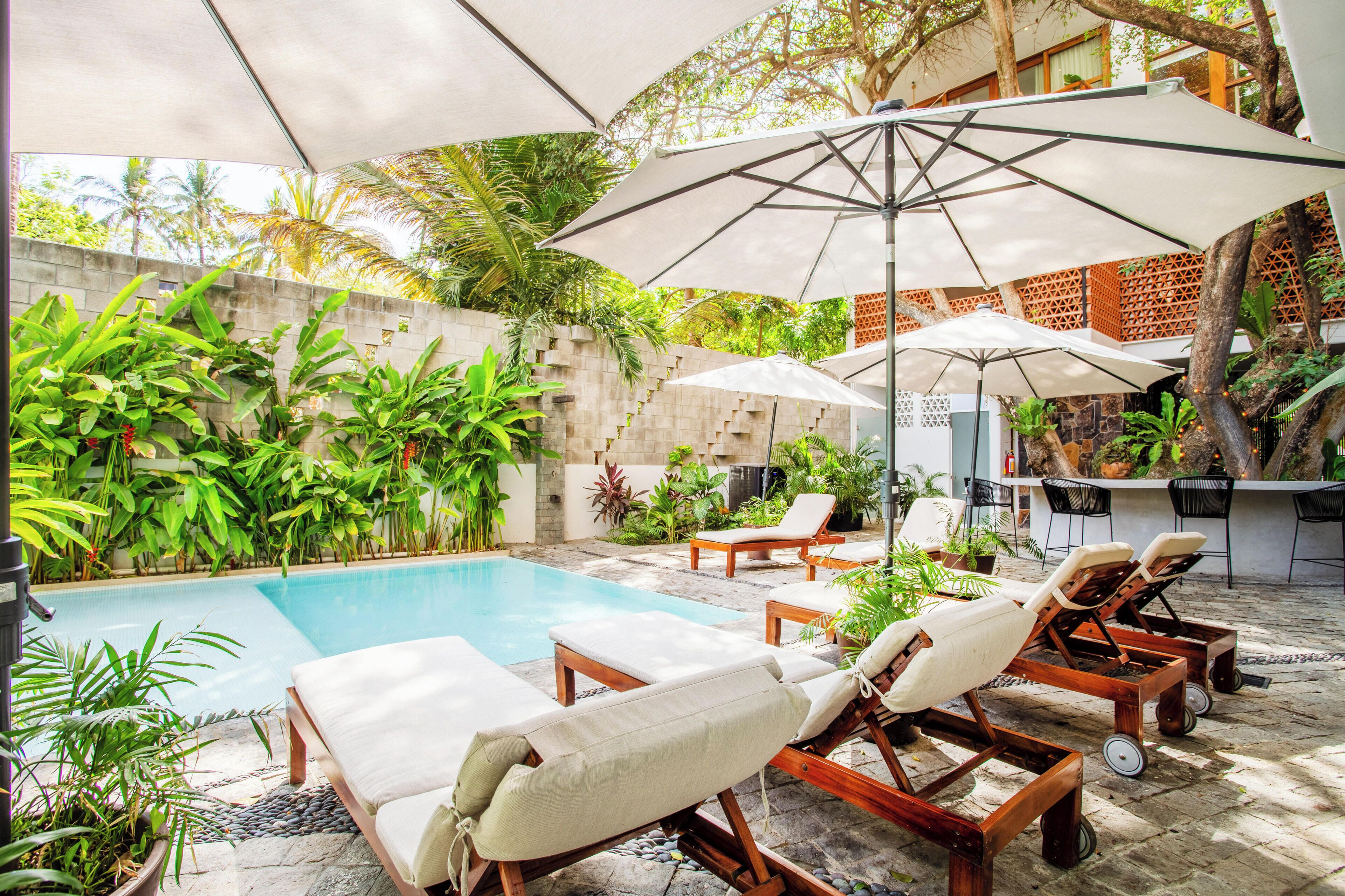 2 indoor pools, outdoor pool, open 9:00 am to 9:30 pm, pool umbrellas