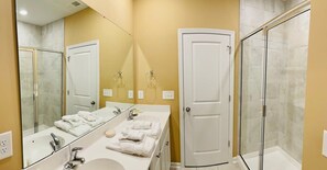 Bathtub, hair dryer, towels