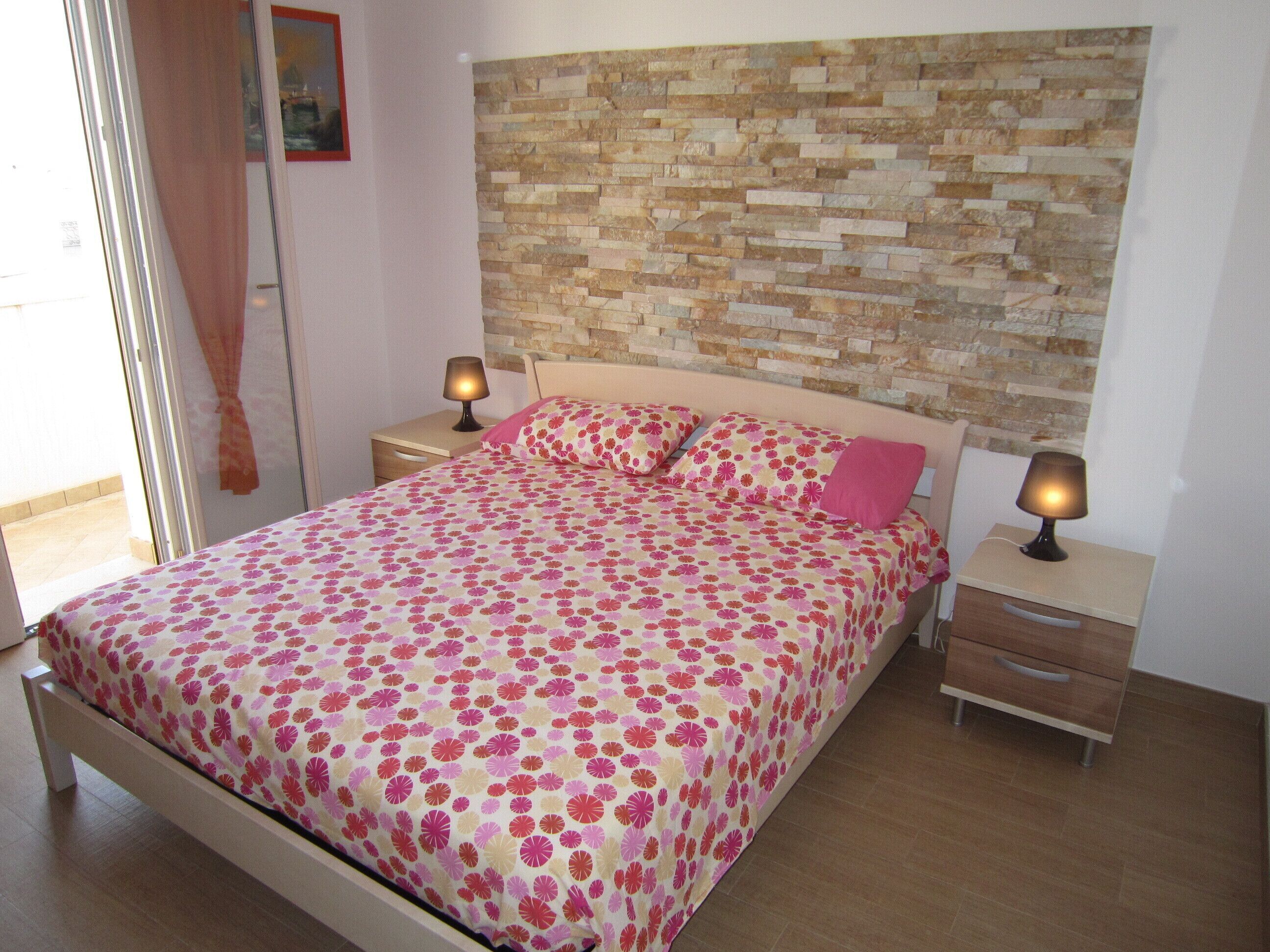 2 bedrooms, in-room safe, iron/ironing board, travel crib