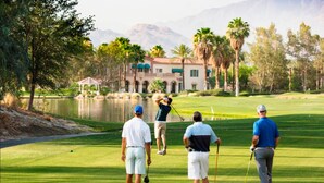 A golf course with a pavilion, palm trees, and a mountain view. - 2 BD/2BA Full Size Villa @ Marriot's Shadow Ridge I - The Villages - BNP Tennis! (Palm Desert)