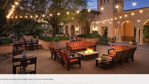 An outdoor patio with seating and a fire pit at The Grill at Shadow Ridge. - 2 BD/2BA Full Size Villa @ Marriot's Shadow Ridge I - The Villages - BNP Tennis! (Palm Desert)