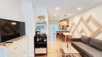 Smart TV, fireplace, books