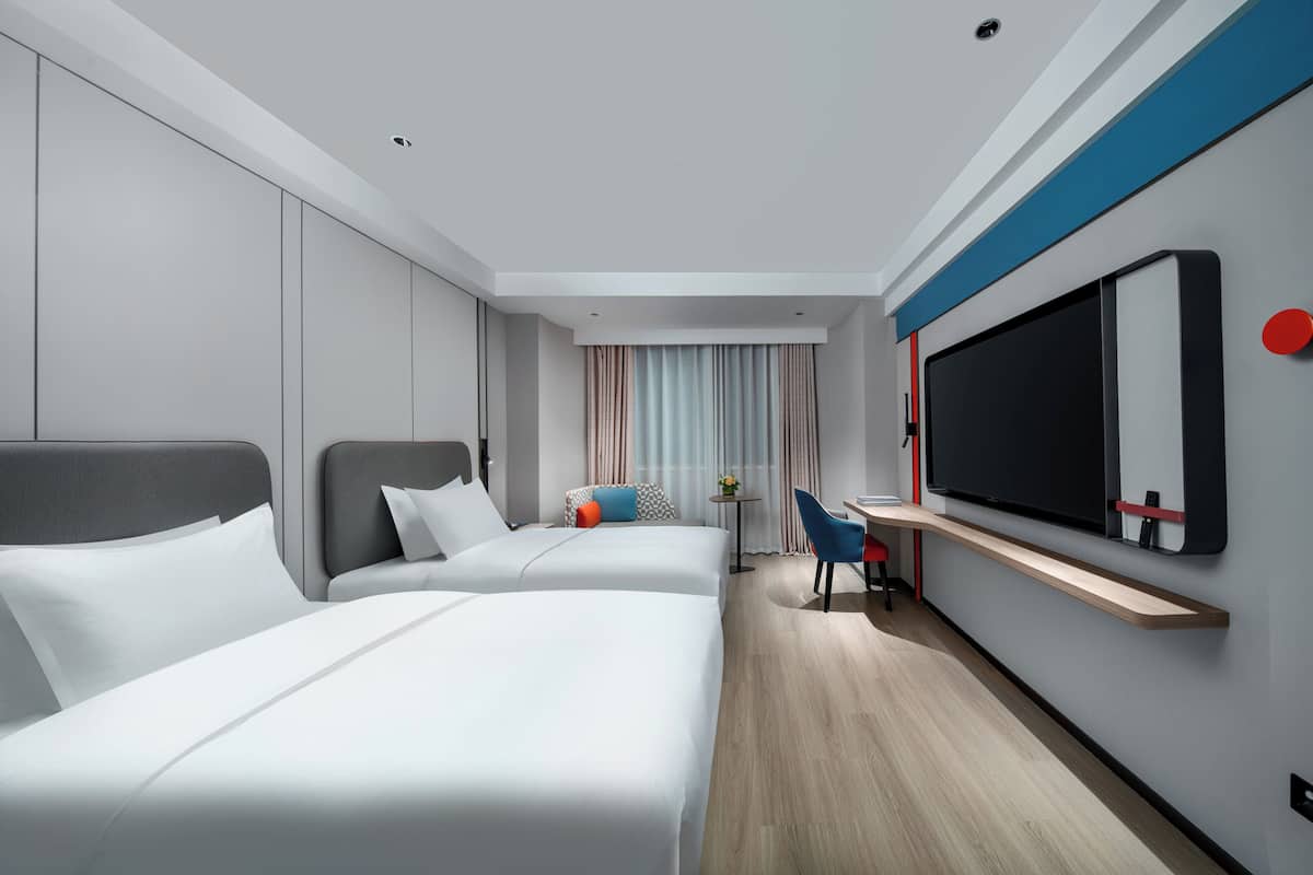 Premium bedding, down duvets, desk, laptop workspace