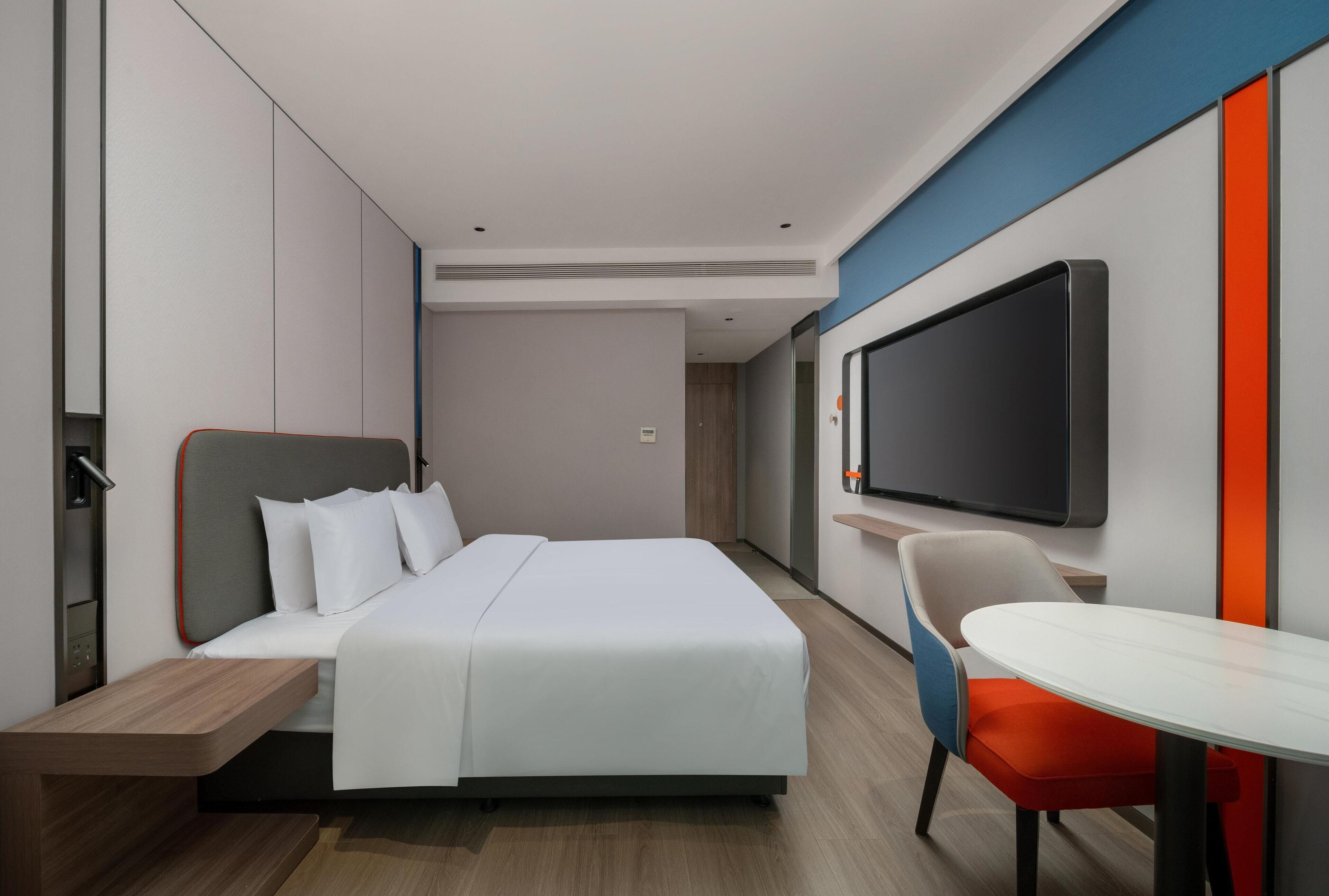 Premium bedding, down duvets, desk, laptop workspace