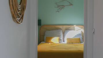 2 habitaciones, tabla de planchar con plancha, wifi y ropa de cama