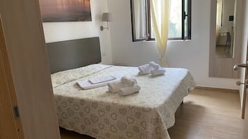 1 Schlafzimmer, BĂŒgeleisen/BĂŒgelbrett, kostenloses WLAN, BettwĂ€sche