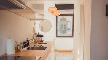 Microwave, oven, coffee/tea maker, cookware/dishes/utensils