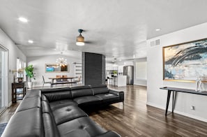 Smart TV, fireplace, table football, books