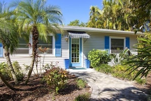 Set amidst lush tropical surroundings, this charming house offers a serene escape.
