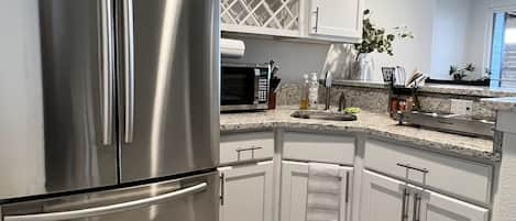 Fridge, microwave, coffee/tea maker, electric kettle