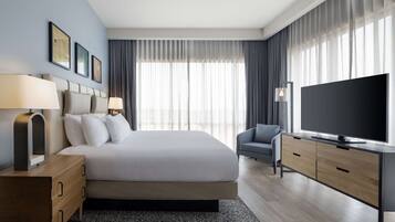 Suite, 1 King Bed, Corner (Tower View) | In-room safe, laptop workspace, blackout drapes, iron/ironing board