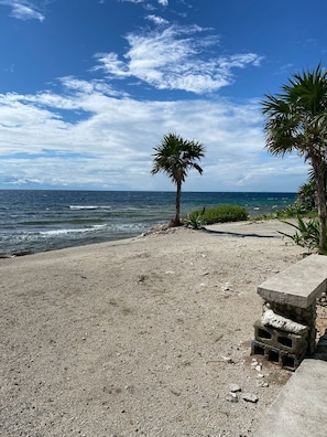 On the beach, sun-loungers, beach towels