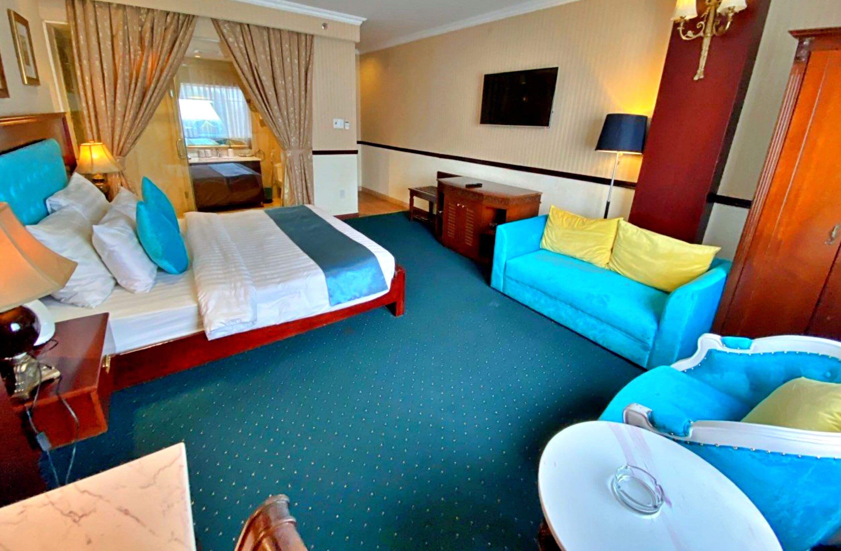 Deluxe Double Room, 1 Queen Bed, City View | Minibar, individually decorated, individually furnished, desk