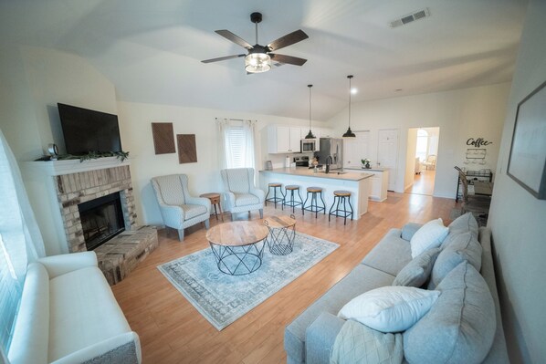 Smart TV, fireplace, books