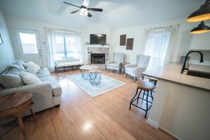 Smart TV, fireplace, books