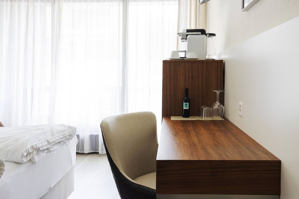 down duvets, minibar, desk, laptop workspace