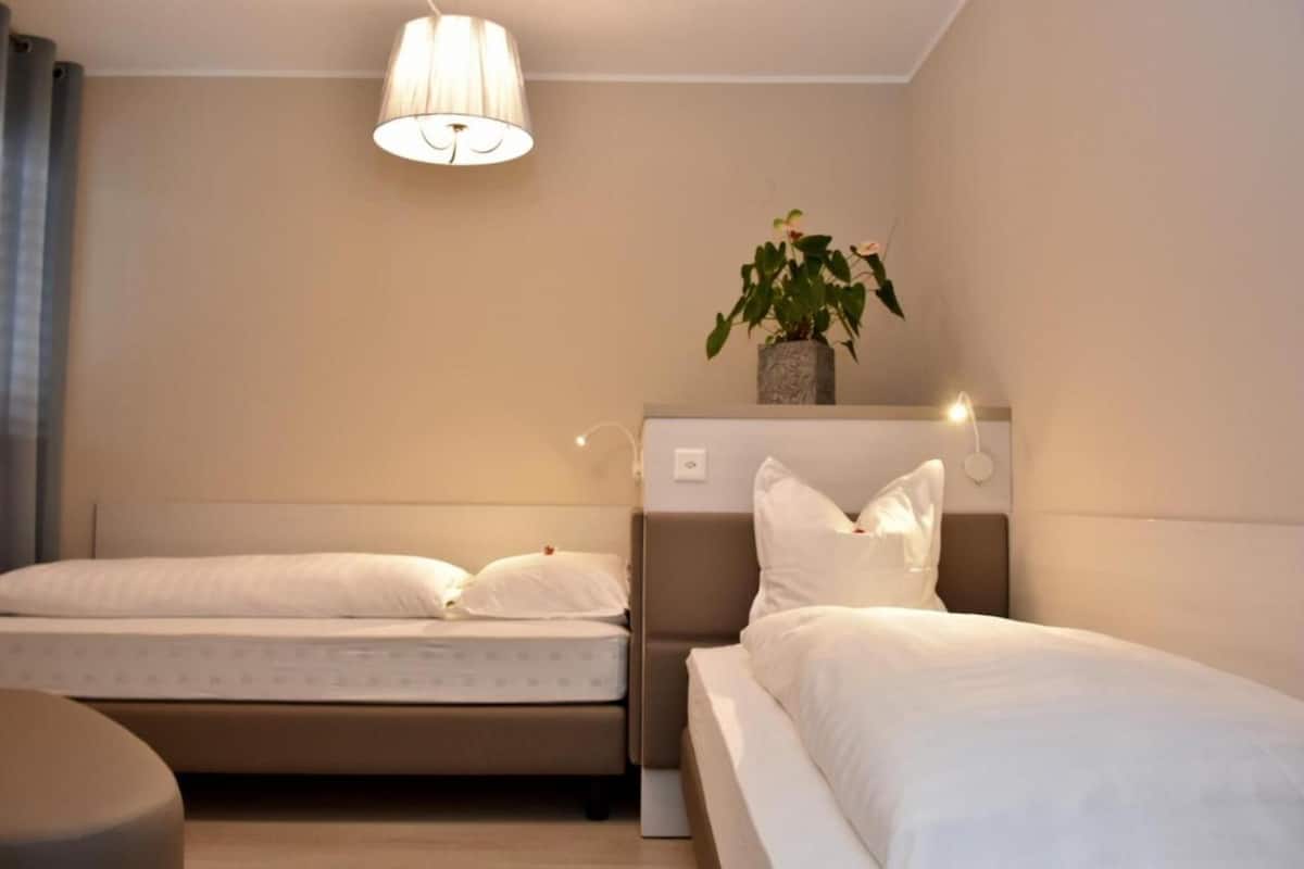 Superior-Apartment | 3 Schlafzimmer, Daunenbettdecken, Minibar, Schreibtisch