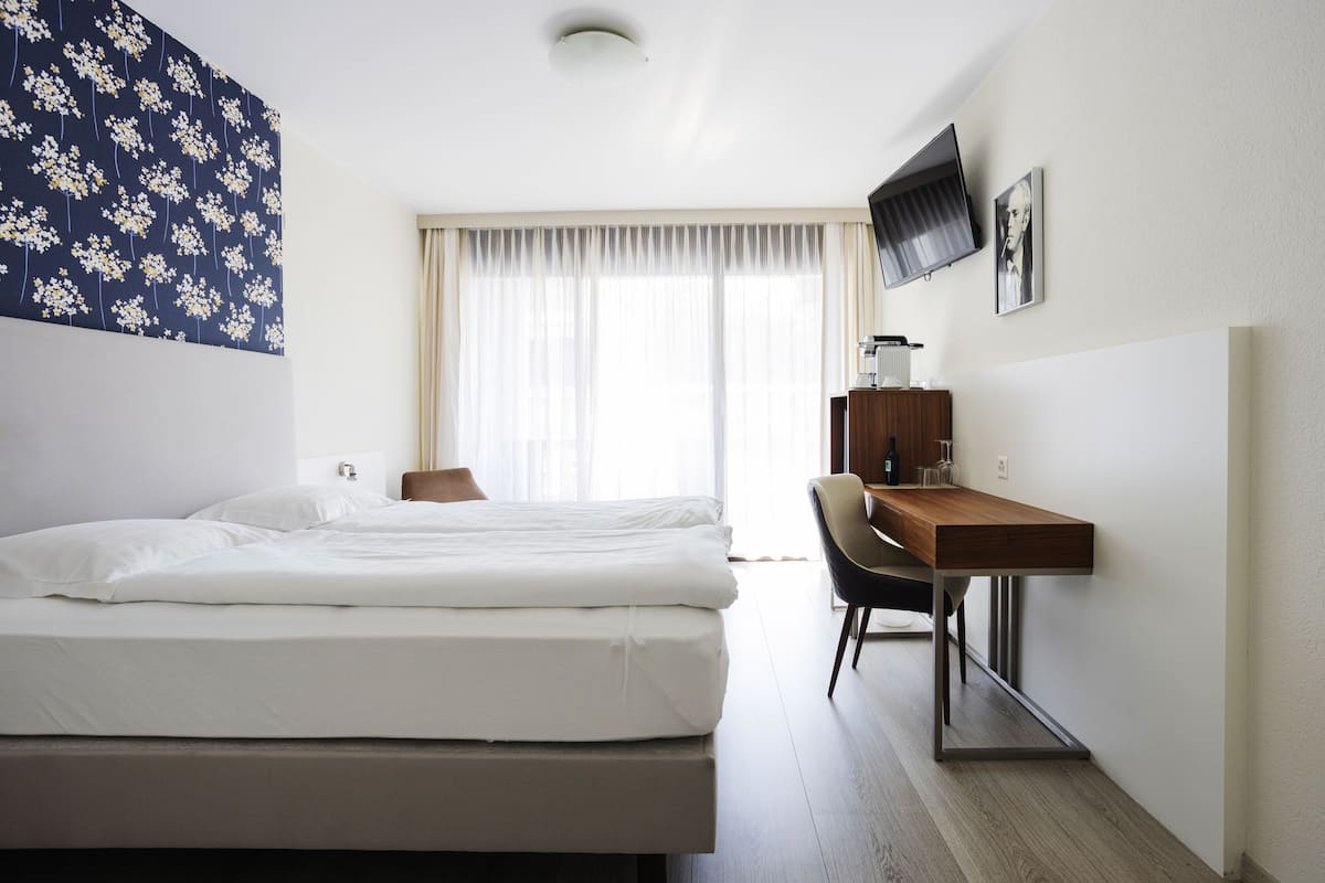 superior double room | down duvets, minibar, desk, laptop workspace