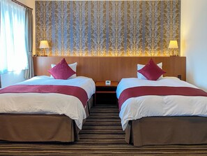 Junior suite, niet-roken | Donsdekens, individueel gedecoreerd, gratis babybedden, gratis wifi