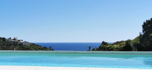 Holiday Home "Angolo dei Fiori" with Sea View, Shared Pool & Air Conditioning